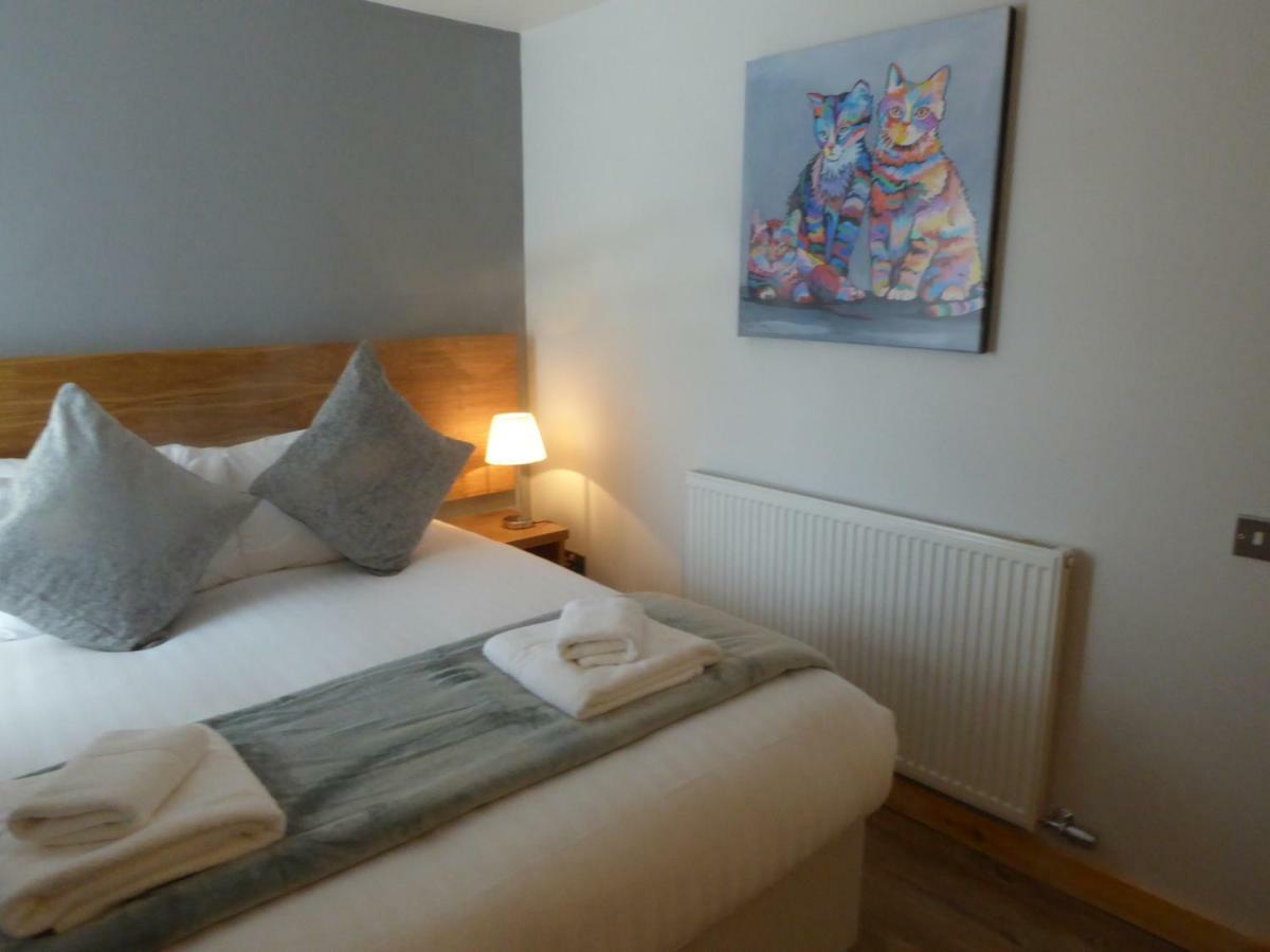 Auchendennan Farm Self Catering Cottages 巴洛赫 外观 照片